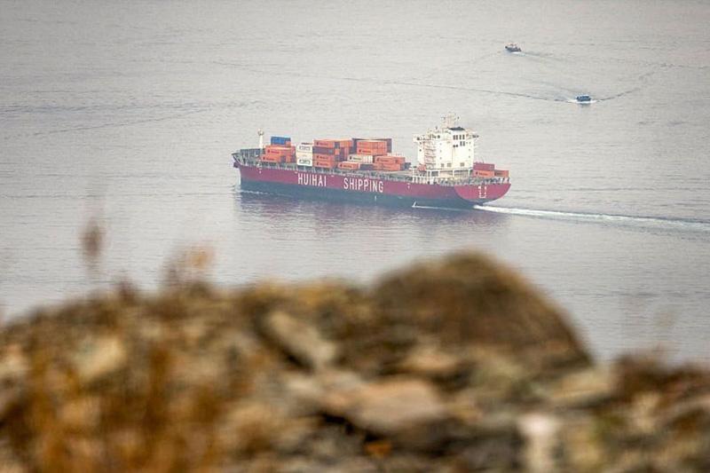 Two Singapore-flagged container ships struck in Hormuz, one sinks